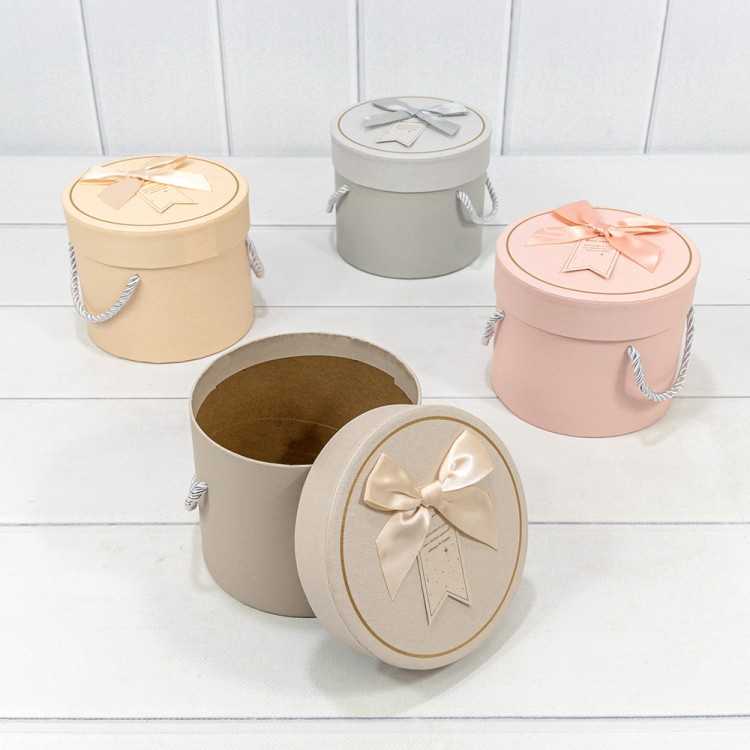 Коробка Круглая 13,8*11,5 с ручками и бантиком (микс 18) 1/4 1/48 Арт: 721819/18